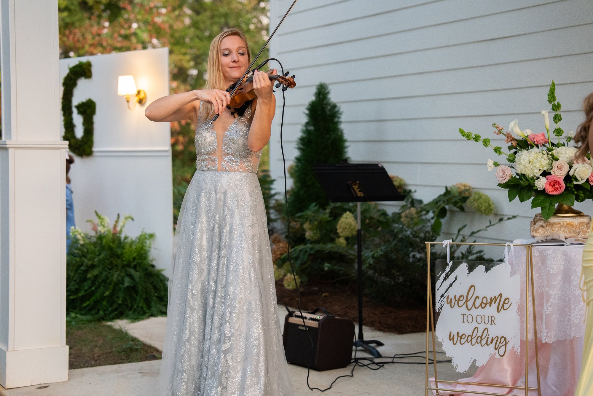 Margarita performing outdoors among event guests