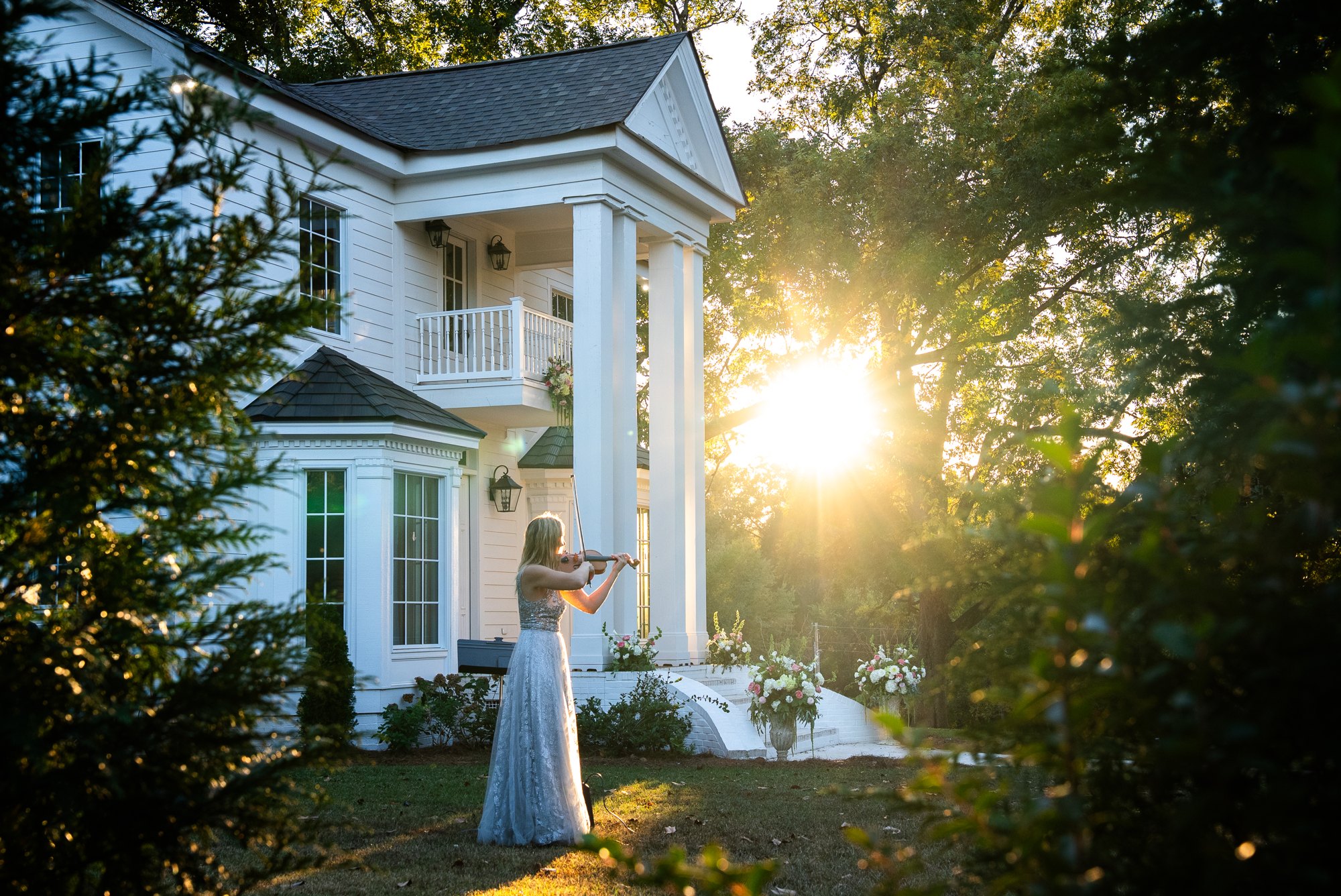 Violin music at an outdoor wedding at golden hour